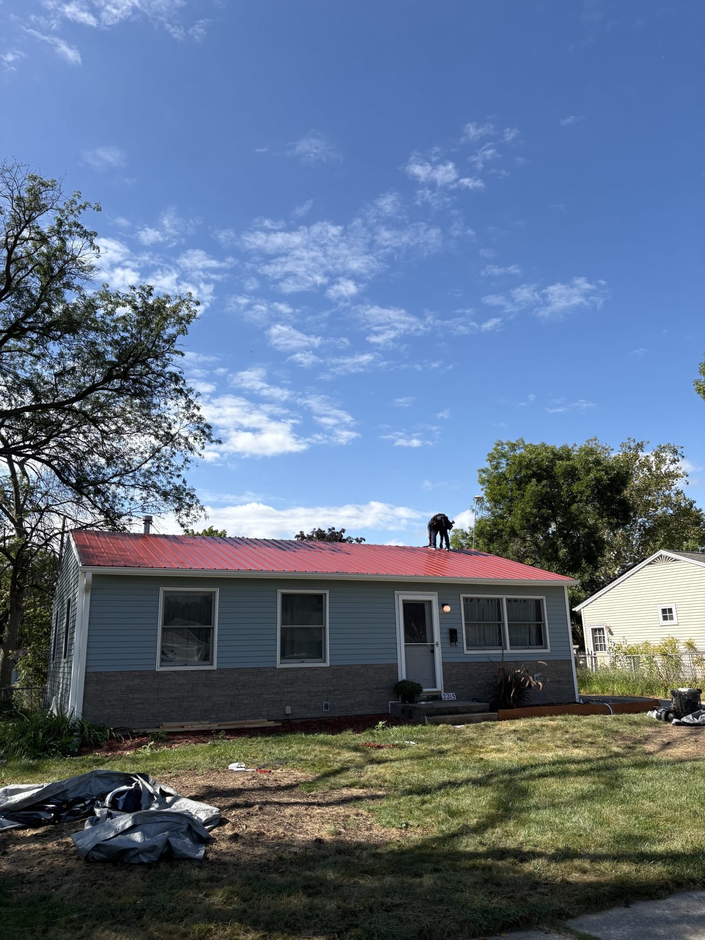 After — new standing-seam metal roof by Summit Construction